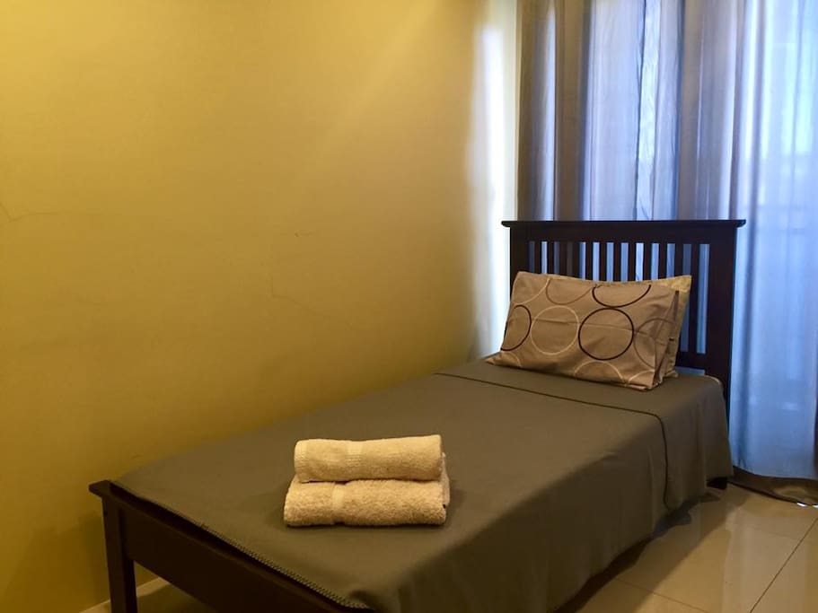 2 Single Beds with 2 extra matress kept under the beds
