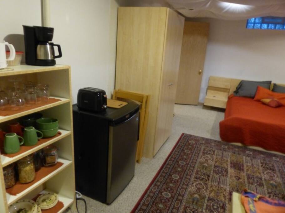 Bedroom shelving for continental breakfast and small refrigerator