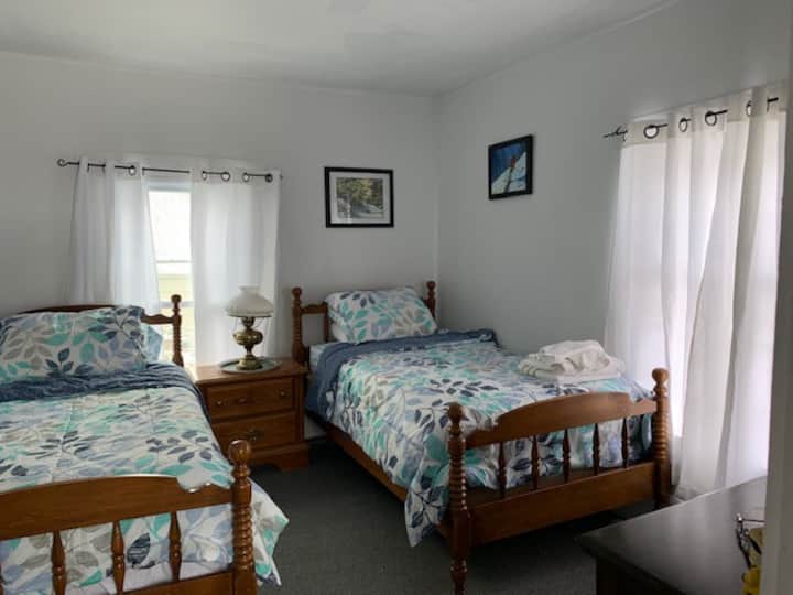 This room offers privacy and quiet as it overlooks the Vermont Salt Cave behind the Coach House.