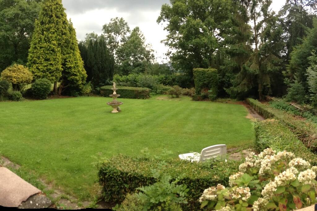 Your view . Beautiful gardens , orchard , outdoor hot tub . Horses grazing in the fields for you to say hello to !