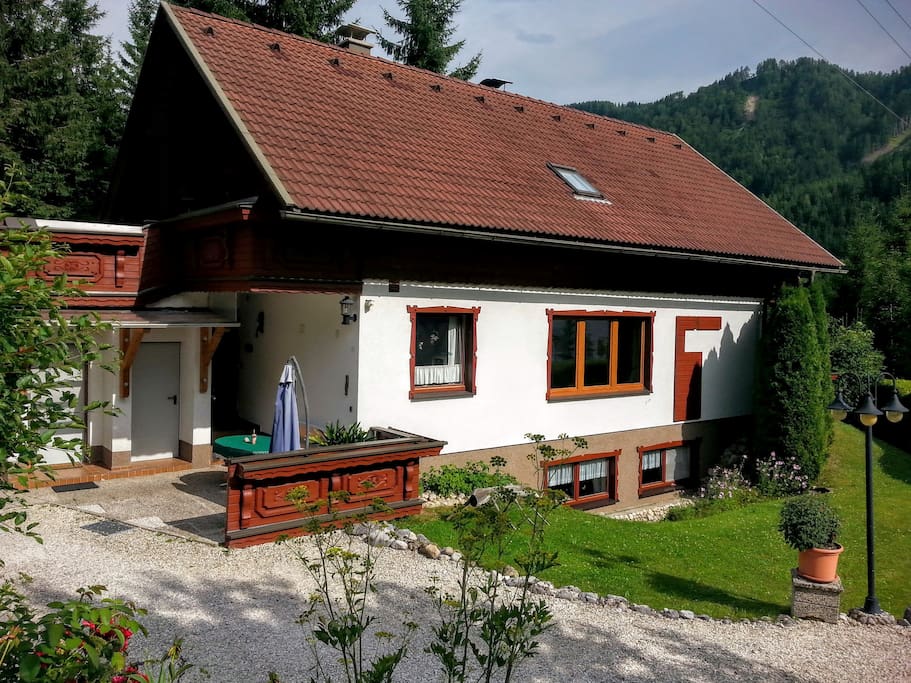 Our house in summer. Top part is Edelweiss apartment (57m2), middle part is our apartment and the lowest part is another apartment we rent out separately, called Edelstein (44m2).