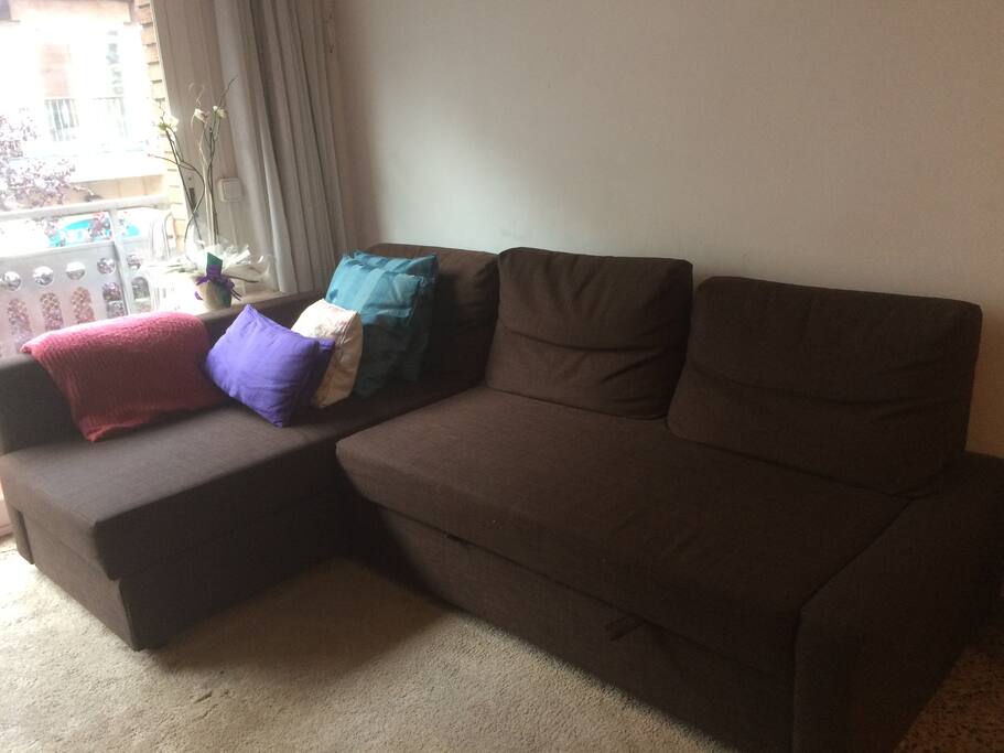 Comfortable sofa in front of the TV.