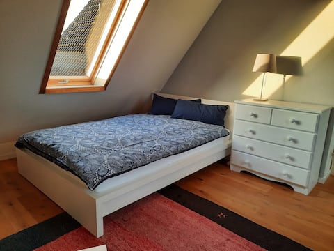 Comfortable living area with private bathroom and kitchen