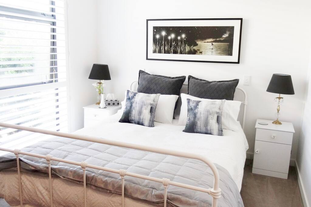 Another Queen bedroom with large wardrobe space and also a desk