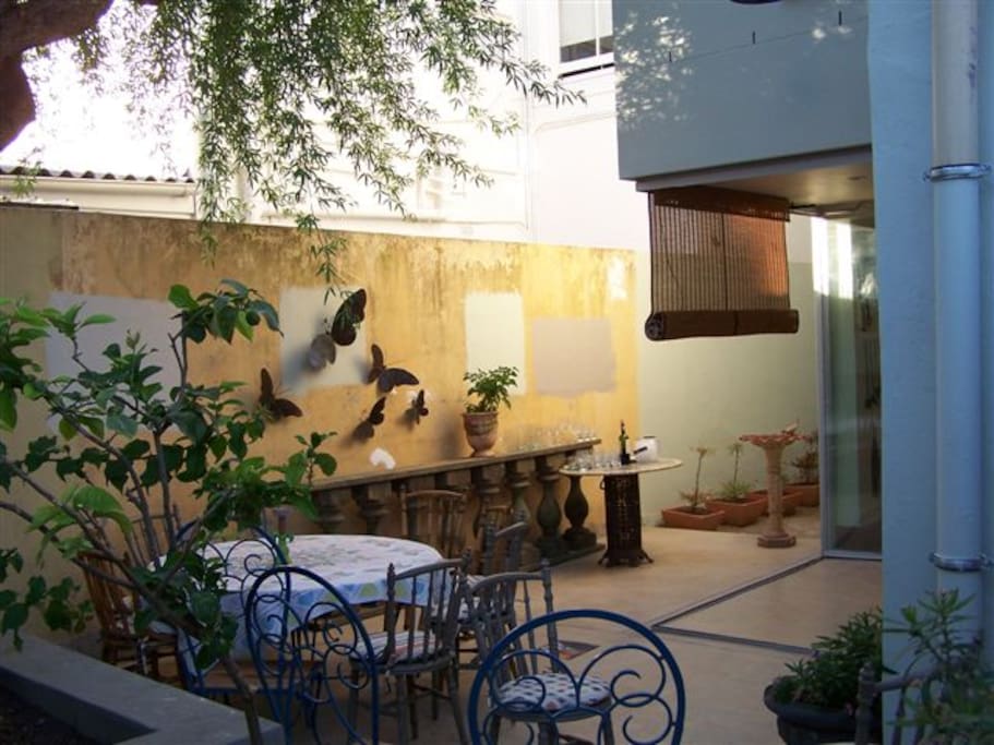 Enclosed back yard, cool in the heat of summer.