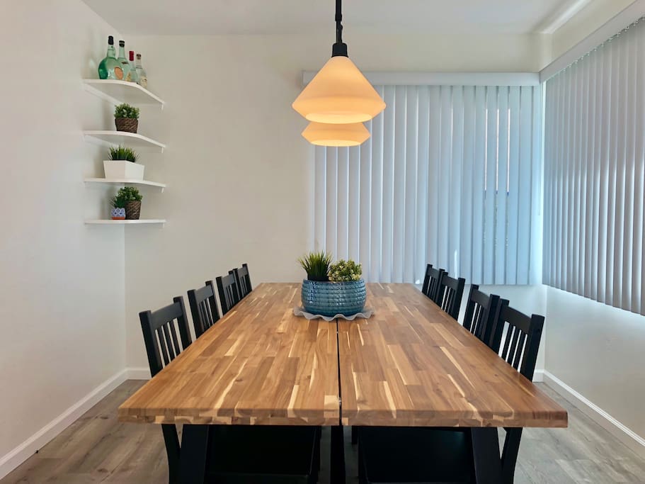 Updated 2018 with new floor, table, seating for 8, and dining room light.