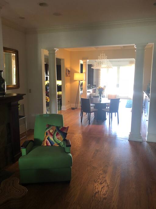 View from entrance, fireplace, dining area