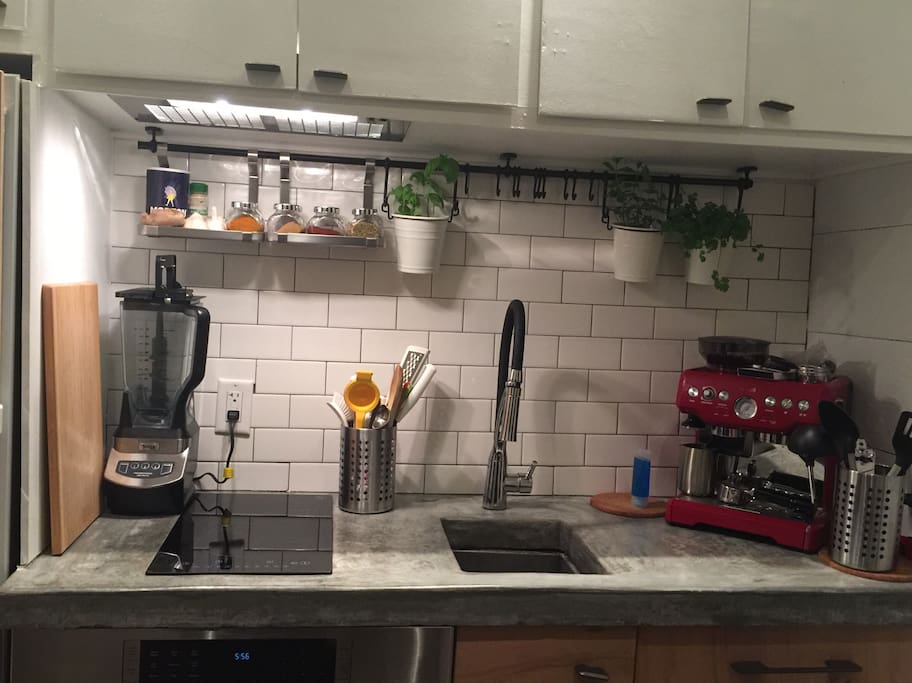 Bosch Speed Oven and Refrigerator. Induction cooktop and Fisher Paykel drawer in this "tiny" kitchen.