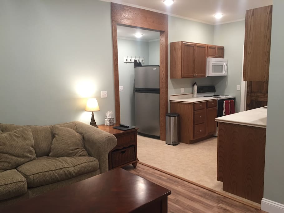 TV area is next to the kitchen.