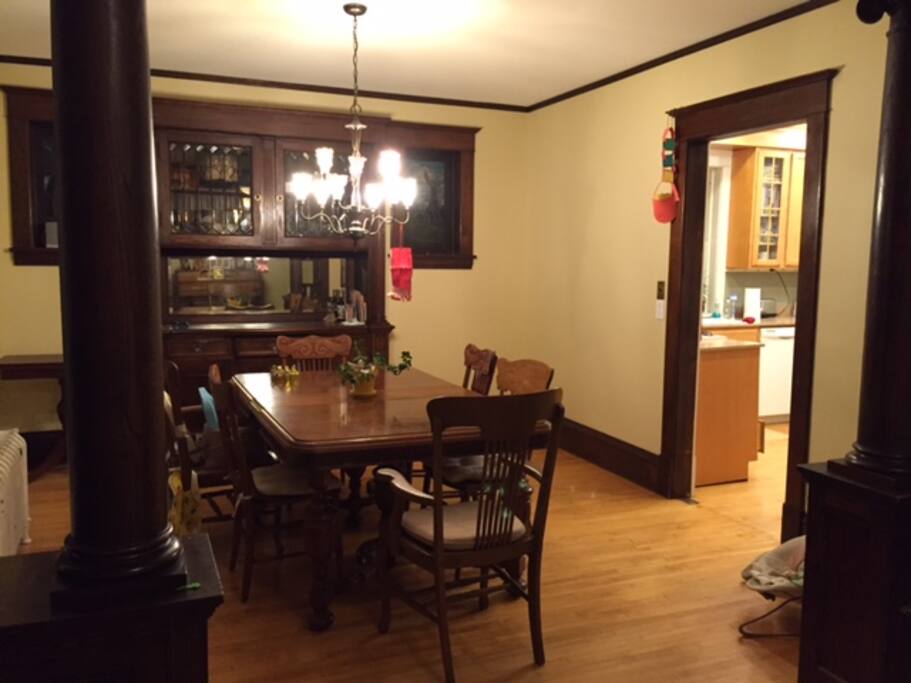 Dining room with built-in buffet and stained glass windows