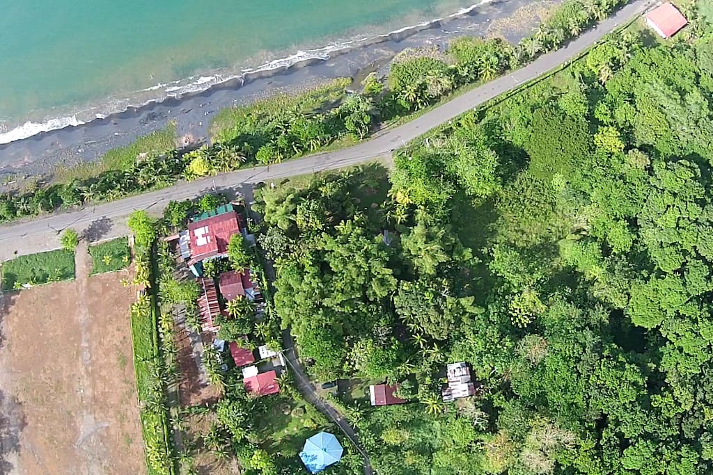 We are here in the photo below - to the right of the blue roof.
One minute walk to the beach.