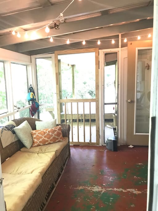 Screened in porch area with hammock available