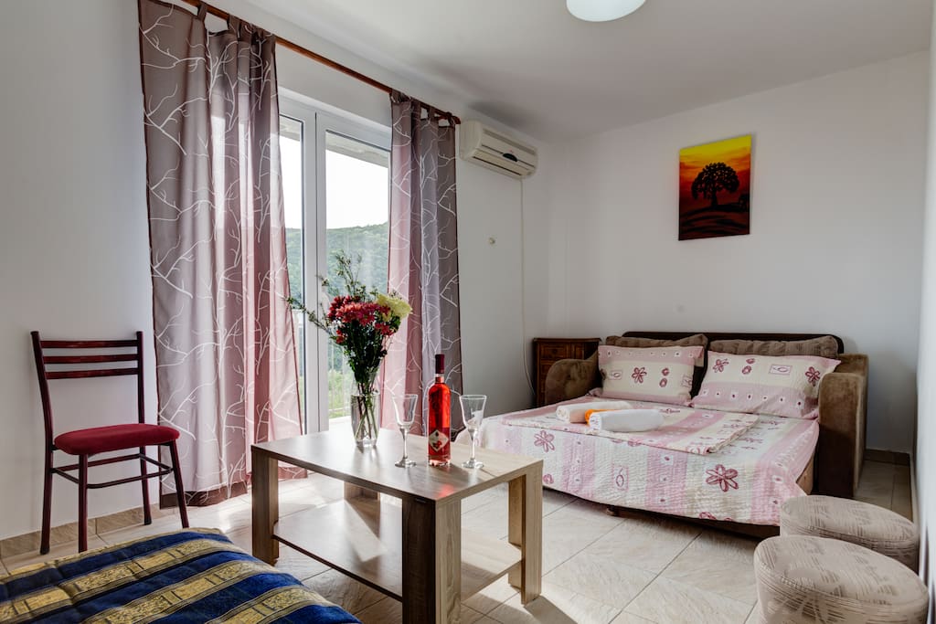 Our apartment is suitable for 4 guests. Living room, beside being a way to reach balcony, can be used for sleeping purposes.