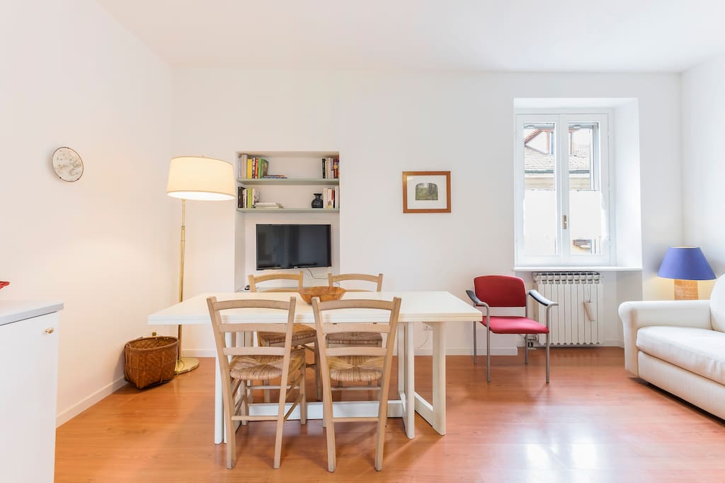 The Living room - The perfect relax area with the dining table & the TV