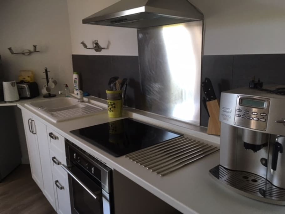 Brand new fully equipped kitchen including oven, microwave, electric hob, fridge/freezer, kettle, coffee machine and toaster.
