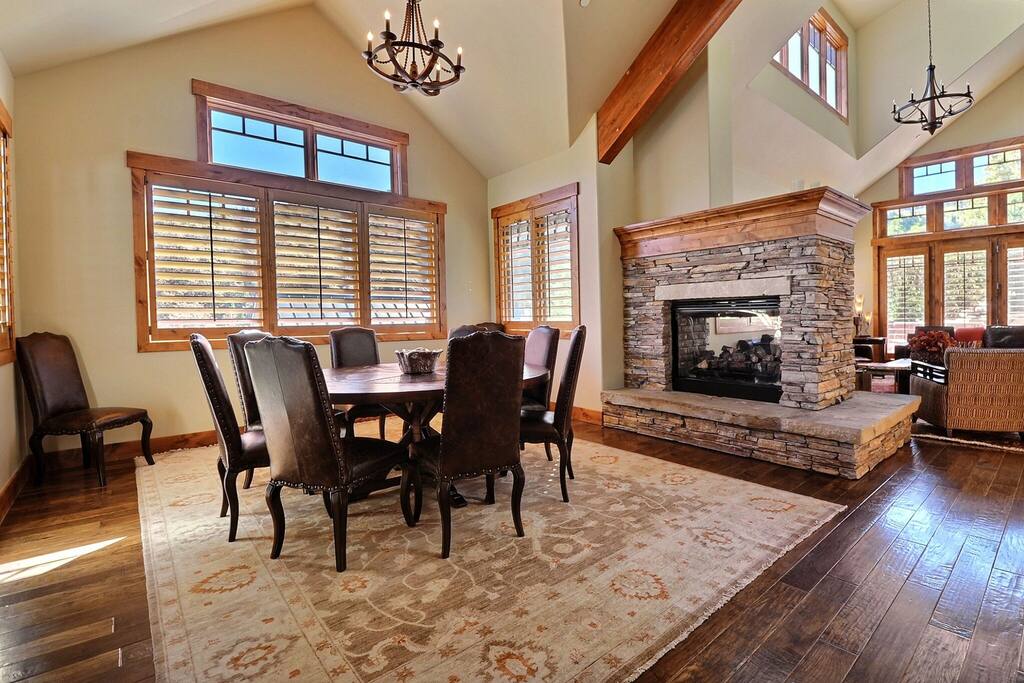Full size dining room with space for ten people around the table.