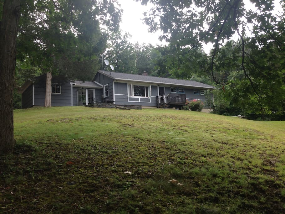 The house sits up on a hill.