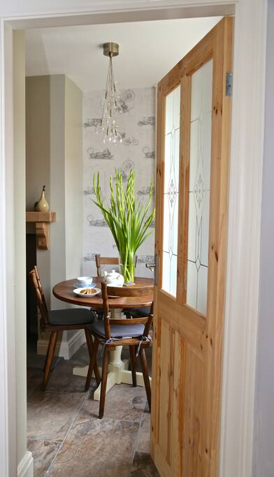 Cottage kitchen with log burner.