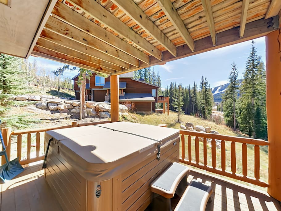 Relax in the hot tub conveniently located on the covered deck.