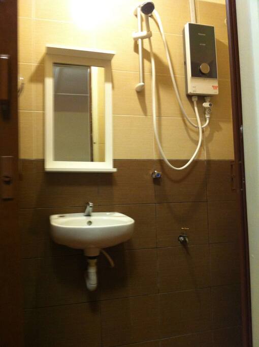 Master bedroom bathroom with shower and water heater