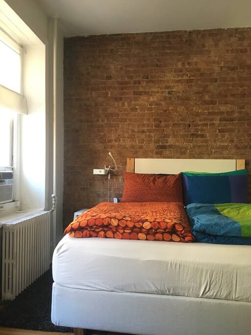 Room 1: has a queen size bed with a memory foam mattress-topper