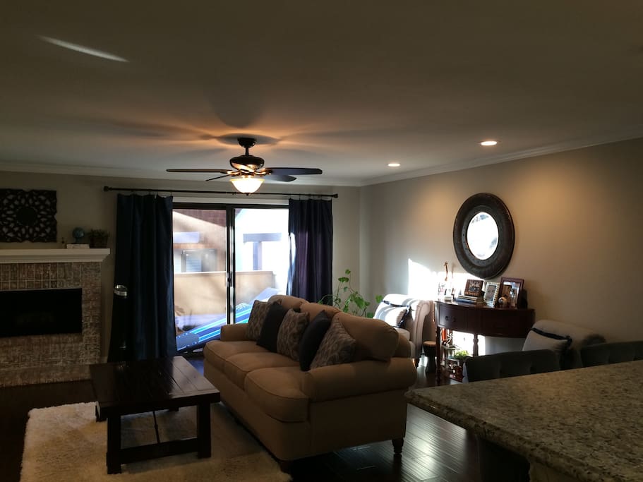Patio with two chase lounges allow for natural light in unit.