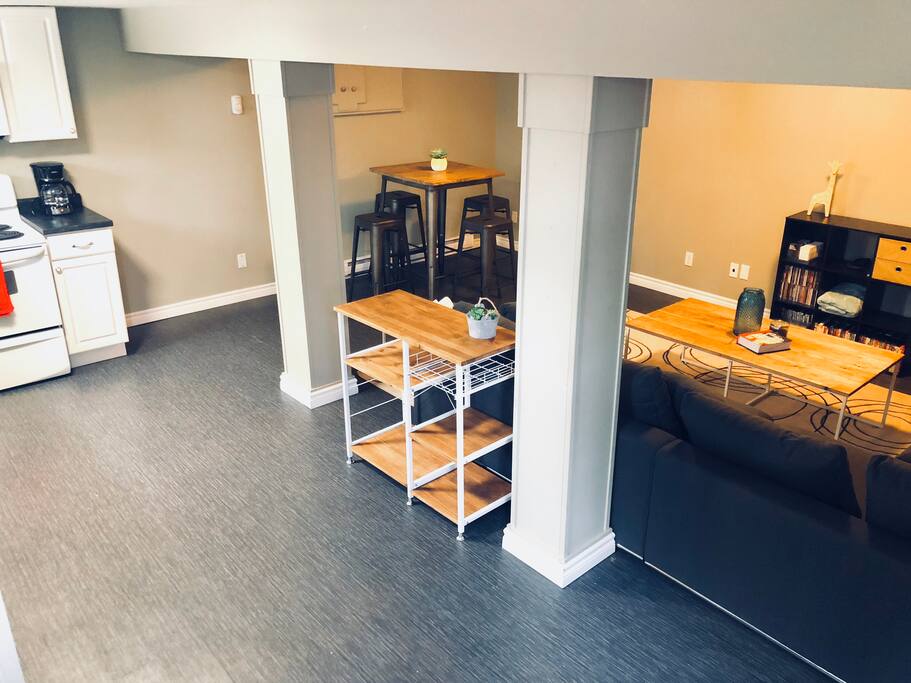 View from the stairs into the open concept living area