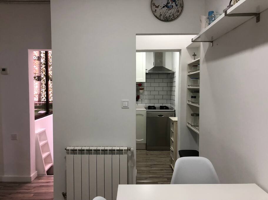 The living area, leading to the kitchen