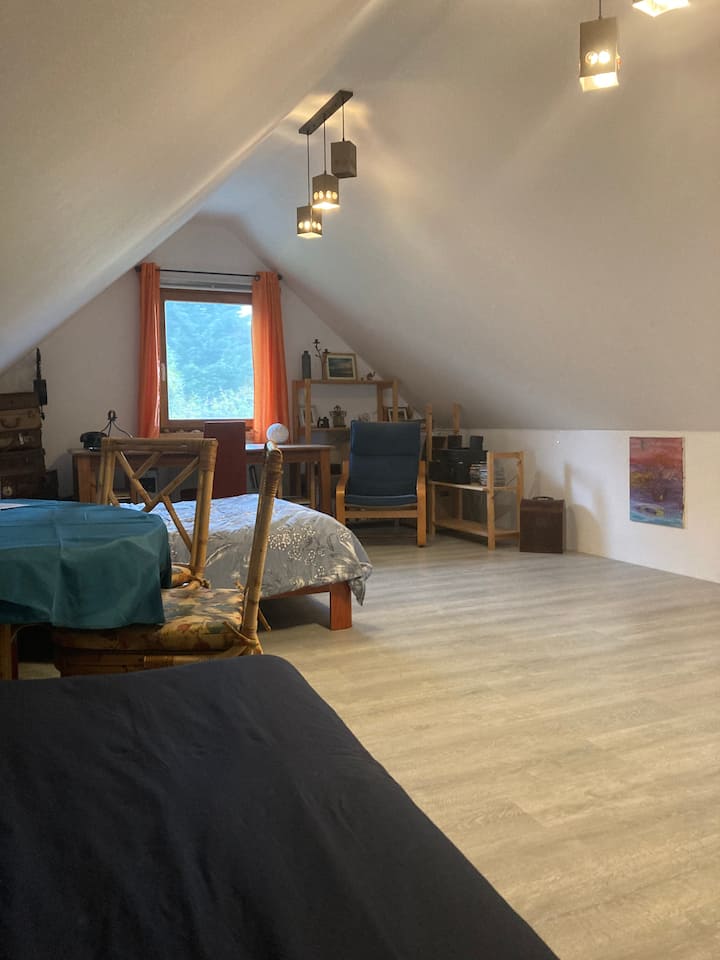 Room with two and single beds