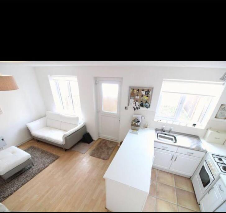 Open plan lounge and kitchen. Bright and airy