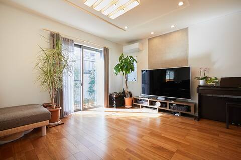 It is a two-story house, a stylish room where you can relax in a large space without the middle of t