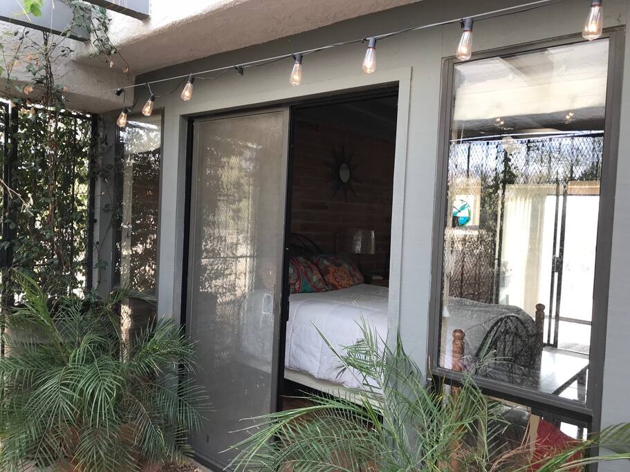 Enclosed wrought-iron area off the bedroom