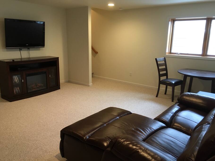 48" TV with Hulu, Netflix, Amazon, and HBO Now over a relaxing electric fireplace. Snuggle up and watch a couple movies.