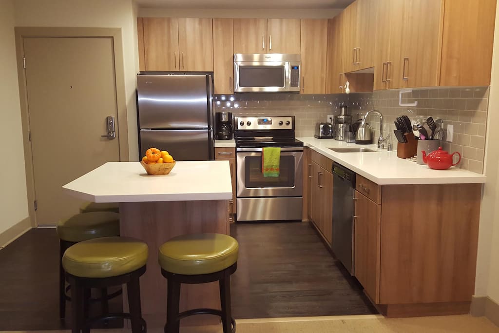 Full kitchen with Breville Juicer, Mr Coffee Coffee Maker, Electric Kettle, Toaster, all cooking needs (pots, pans, etc...), plus basic foods like oils, spices, condiments!