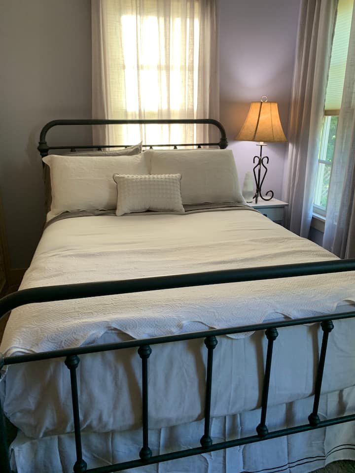 This cozy second bedroom features a double bed and is available when requested with prior arrangement.