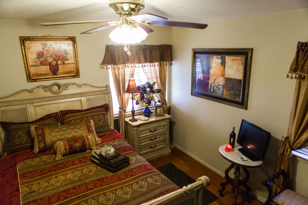 Very comfortable, plush queen bed. A 22 in television with cable and DVD player. Closet with mirrored doors.