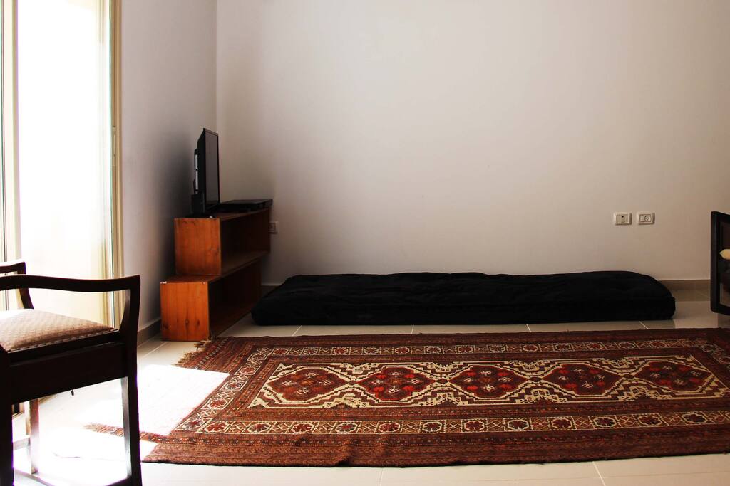 This is where you can put extra mattresses for kids + TV/Cables/DVD