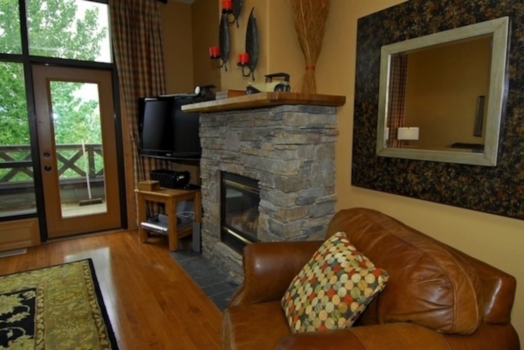 Hardwood floors and cushy furniture make this townhouse warm and inviting