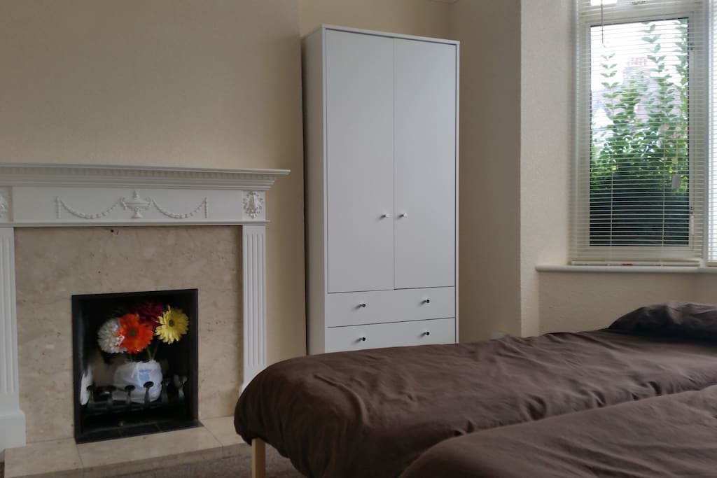 2 single beds and wardrobe