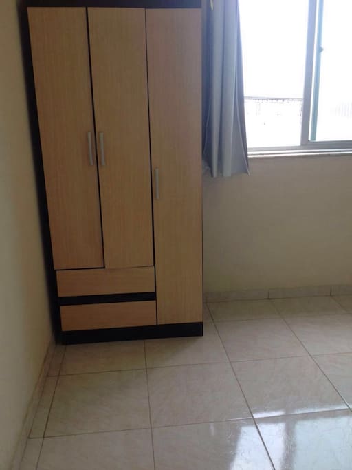 Bedroom 2: it has one small wardrobe and one single bed, it can fit up to two people with another mattress on the floor.
