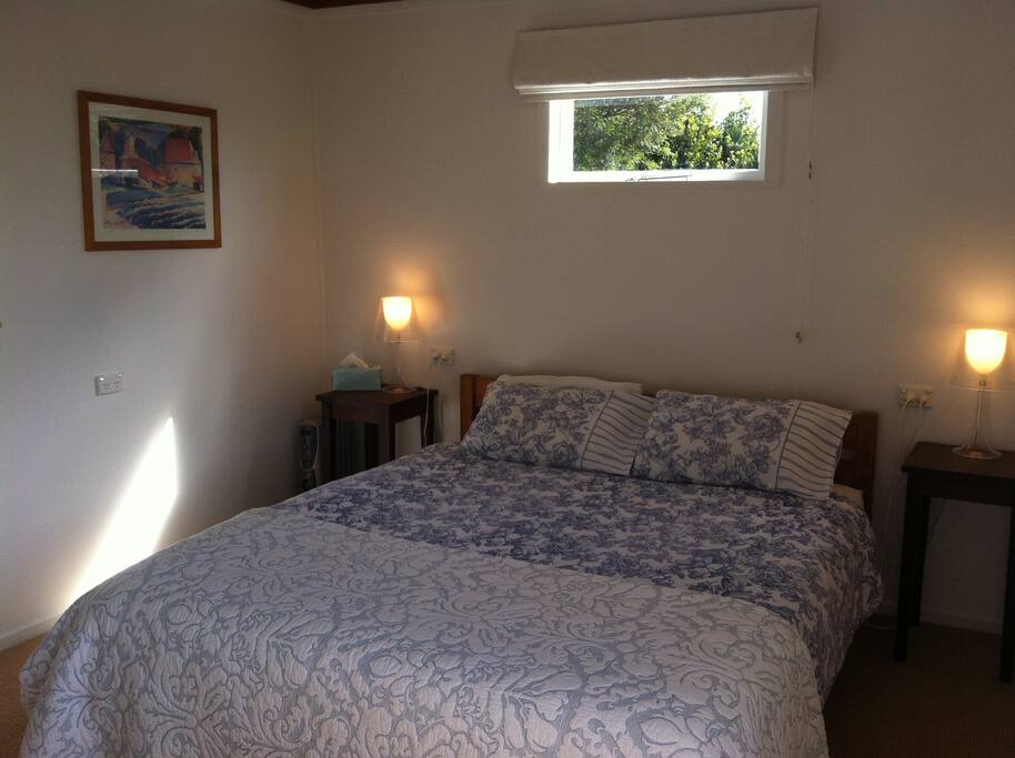 Large bedroom with plenty of room for the king bed with electric blanket.