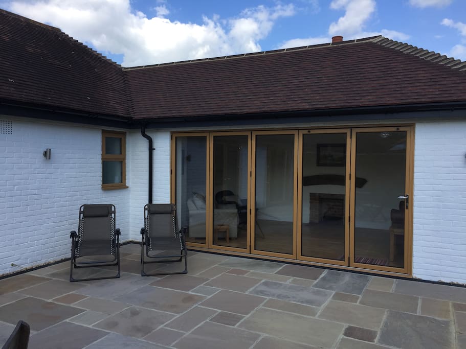 Folding doors to the sitting room