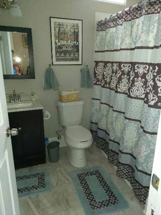 Guest bath. Full bath with Jack and Jill entrance to guest bedroom and living room.