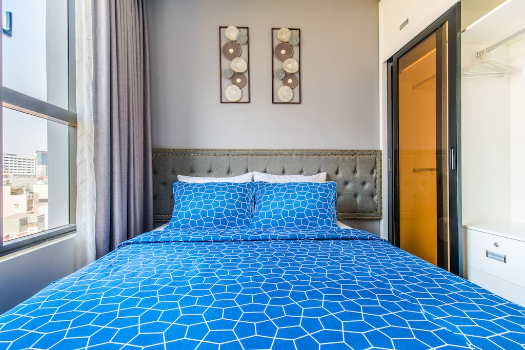 Comfy bedroom with view to outside city for you to explore the local life here and enjoy local experience!