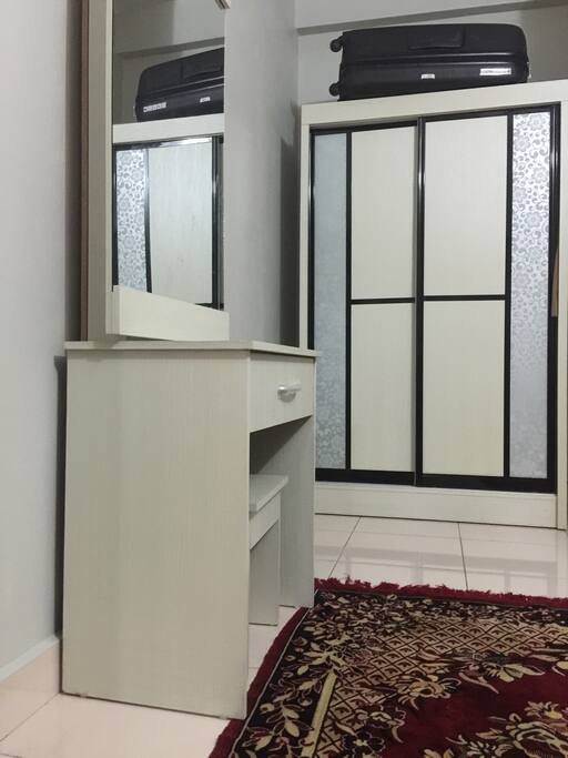 Dressing table and spacious 2 double sliding wardrobe suits with long term stay Apart from that, kettle and iron will be provided upon request to ensure feeling of privacy..