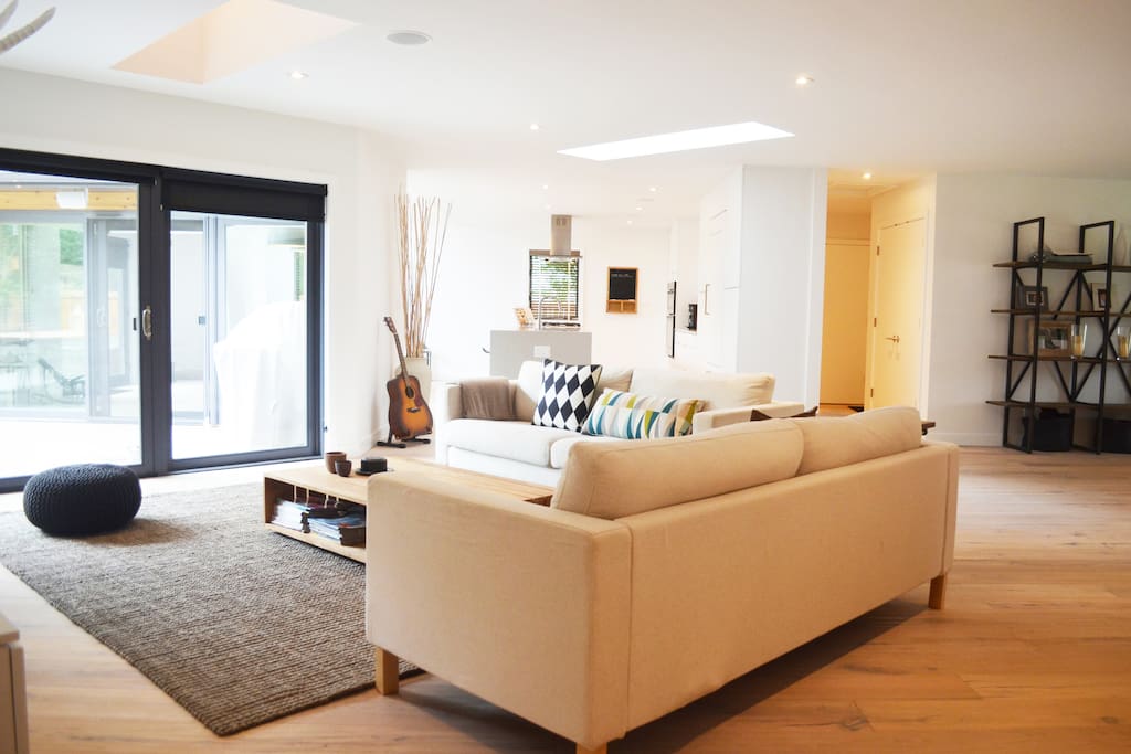 Living room with large sliding doors to deck