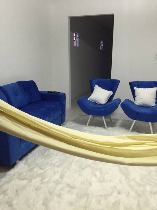living room with couch and hammock