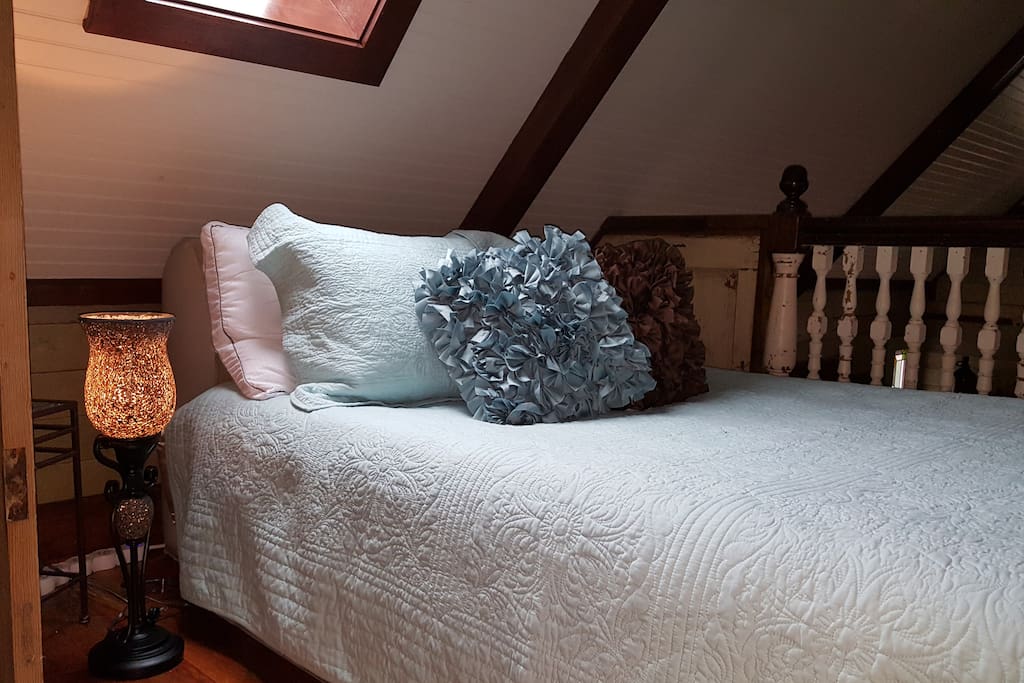 Loft bedroom with queen bed