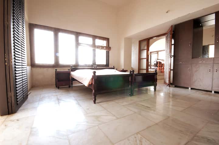 Marble floored bedroom with double bed and en-suite bathroom. Sea views from bedroom and balcony!