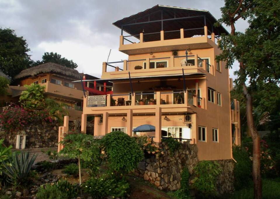 The Inn is in a beautiful stone wall and plant-filled neighborhood.